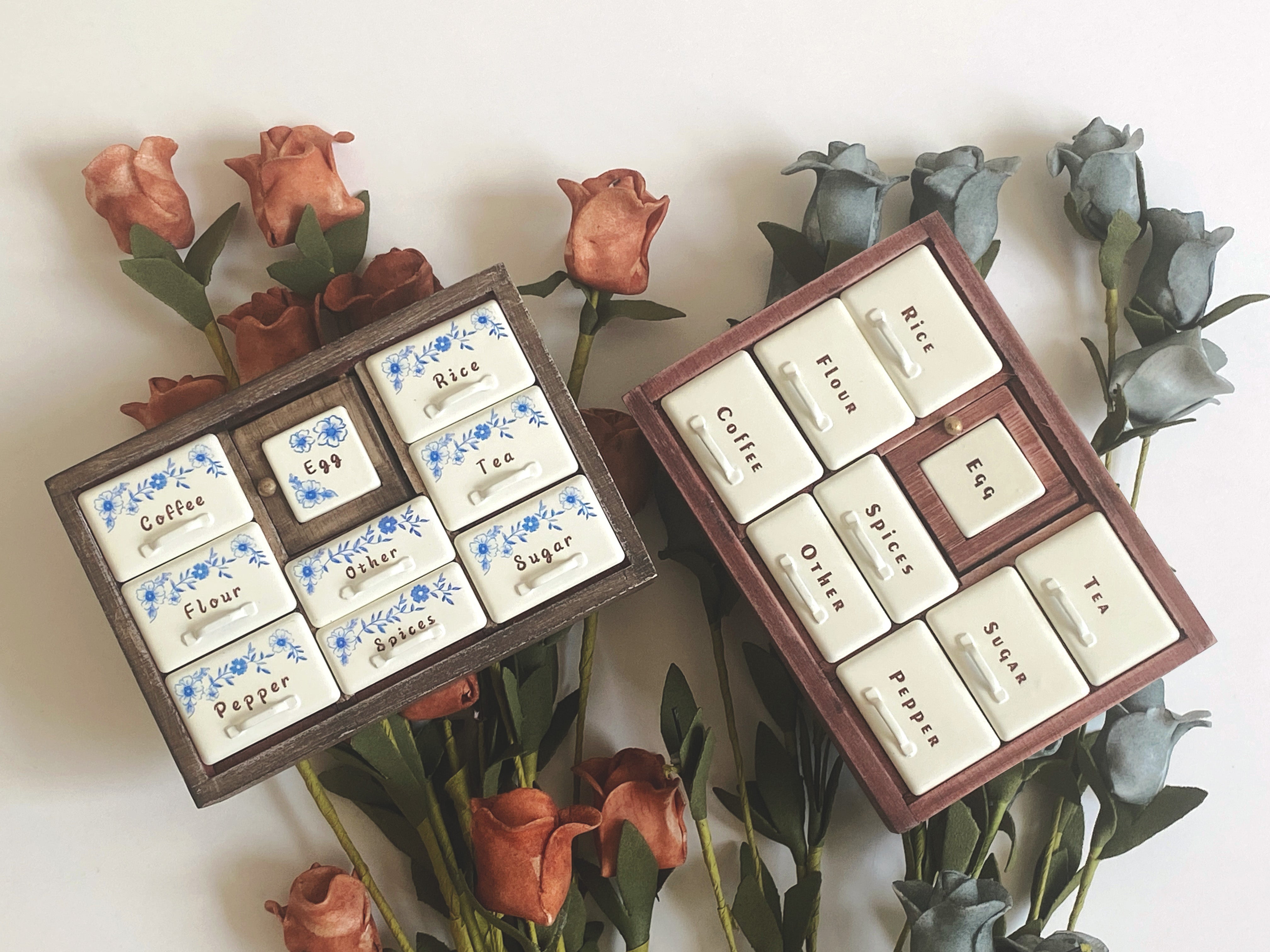 Antler Brown and Red Bean miniature spice cabinets with open drawers and center Egg doors
